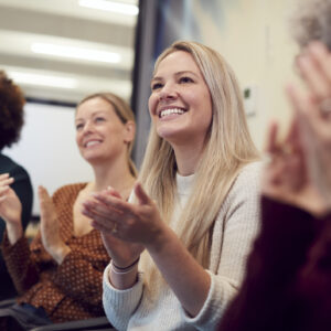 Four women sitting together